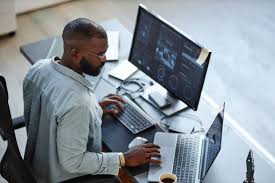 Black Man Analyzing Data Stock Photos ...